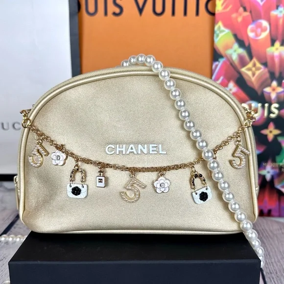CHANEL gold metallic Crossbody pouch with bag charm and pearl chain - Picture 1 of 16